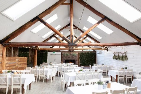 The Carrington Room set with white tables